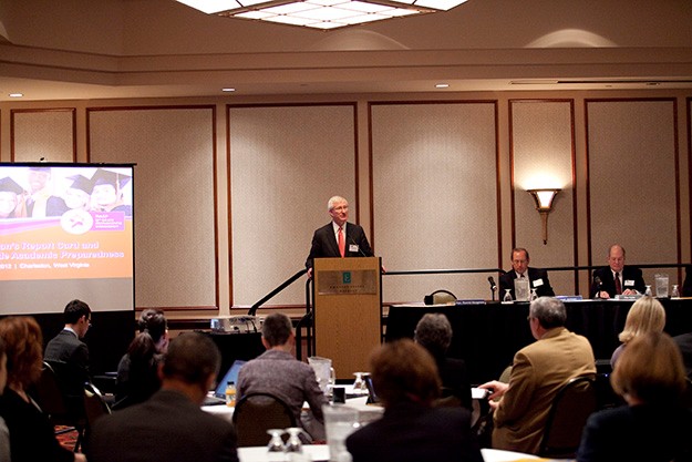 Speaking at podium